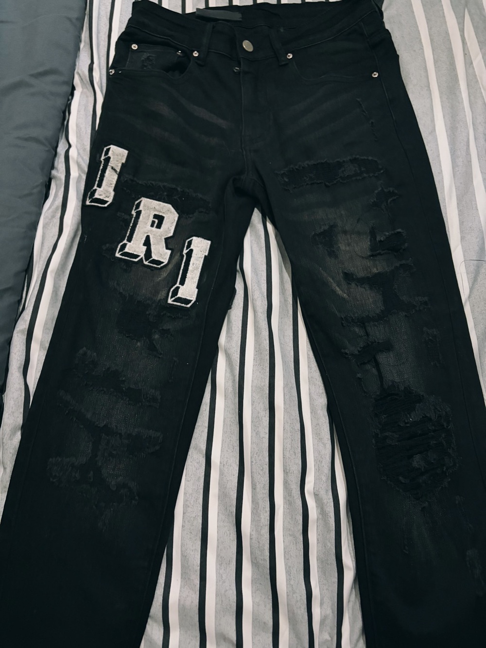 Amiri Black Distressed Men’s Jeans with White 'R1' Patch